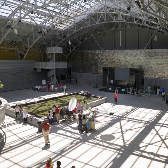 Big Lab with people participating in a variety of science activities