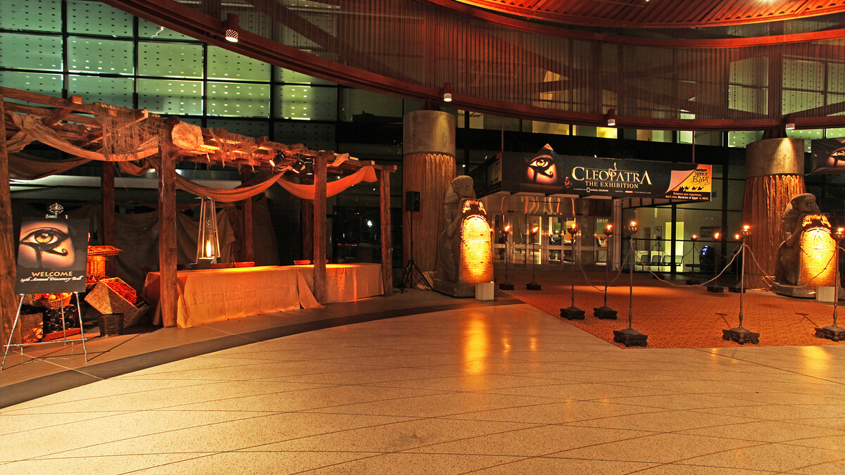 Cleopatra themed event registration in Lorsch Fmaily Pavilion with lluminated Egyptian statues flanking the entrance