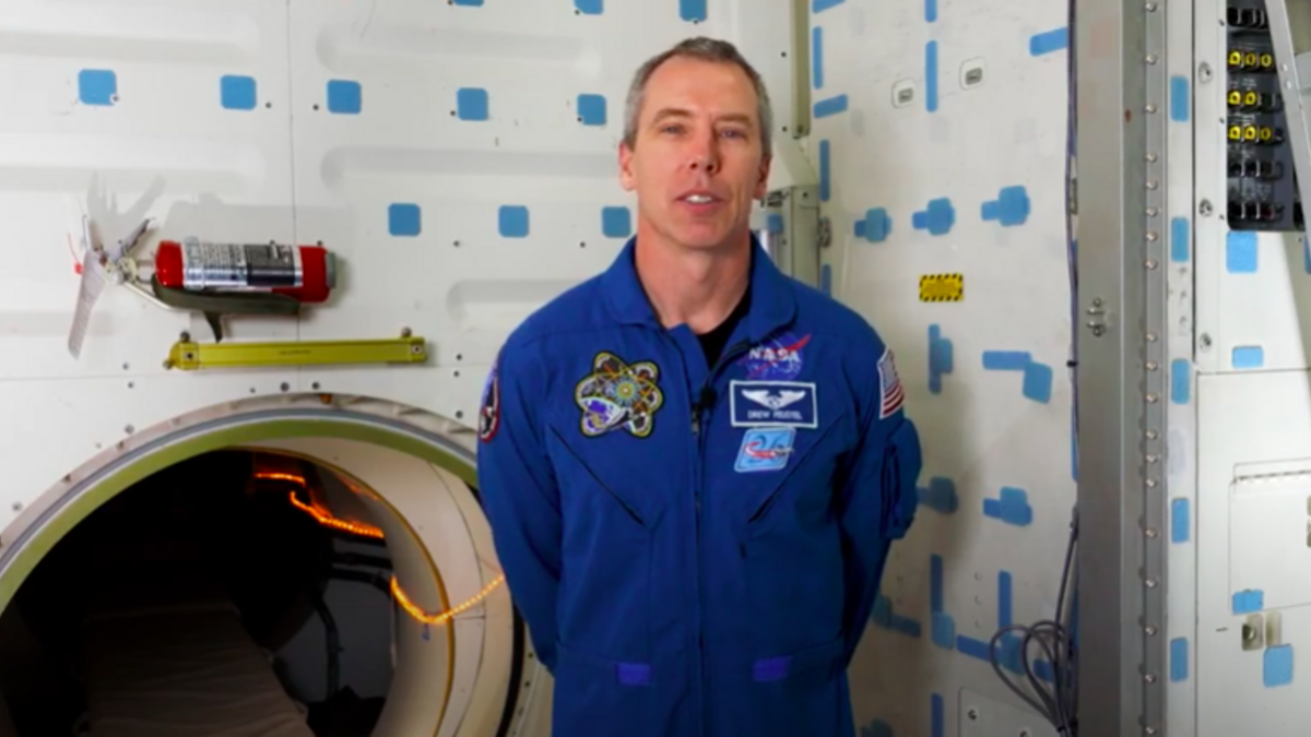 Astronaut Drew Feustel inside space shuttle Endeavour.