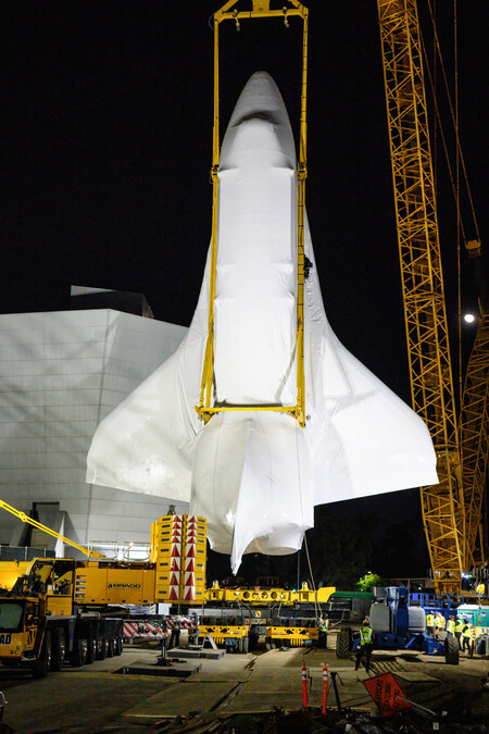 Space Shuttle Endeavour lifting into Samuel Oschin Air and Space Center.