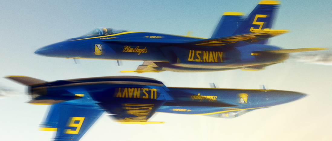 Two Blue Angles aircrafts fly in opposite directions of each other